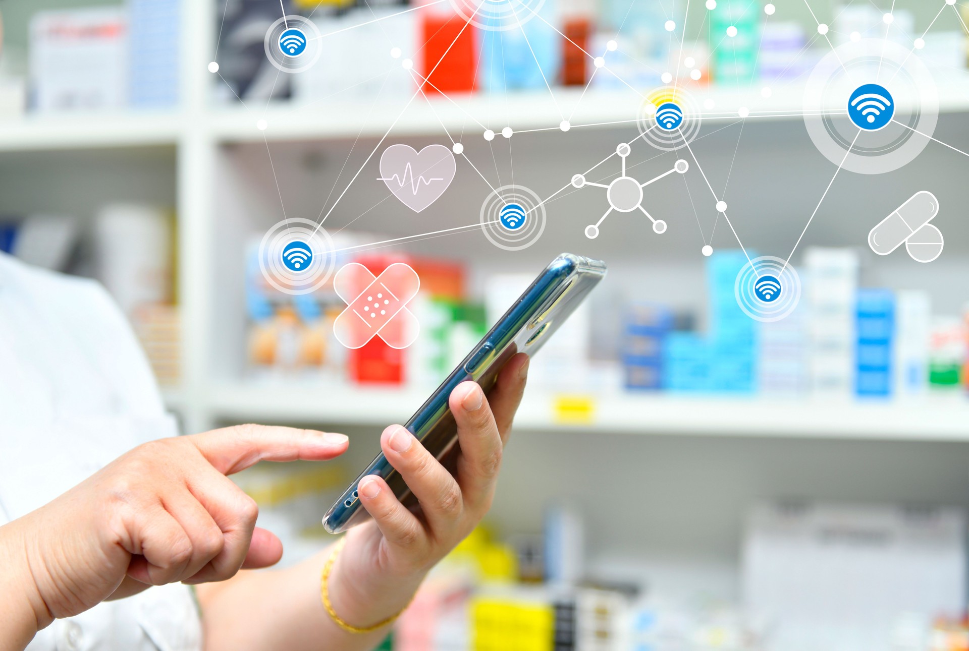 Pharmacist holding computer tablet Using for filling prescription in pharmacy